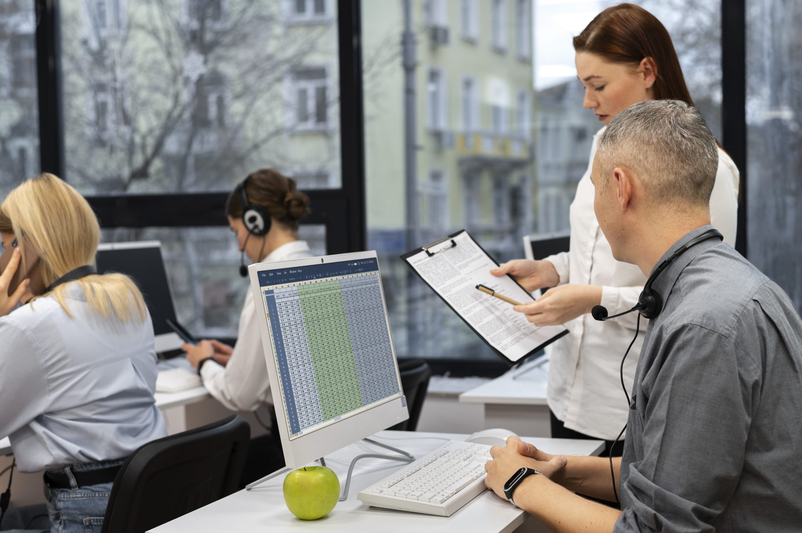 colleagues working together call center office
